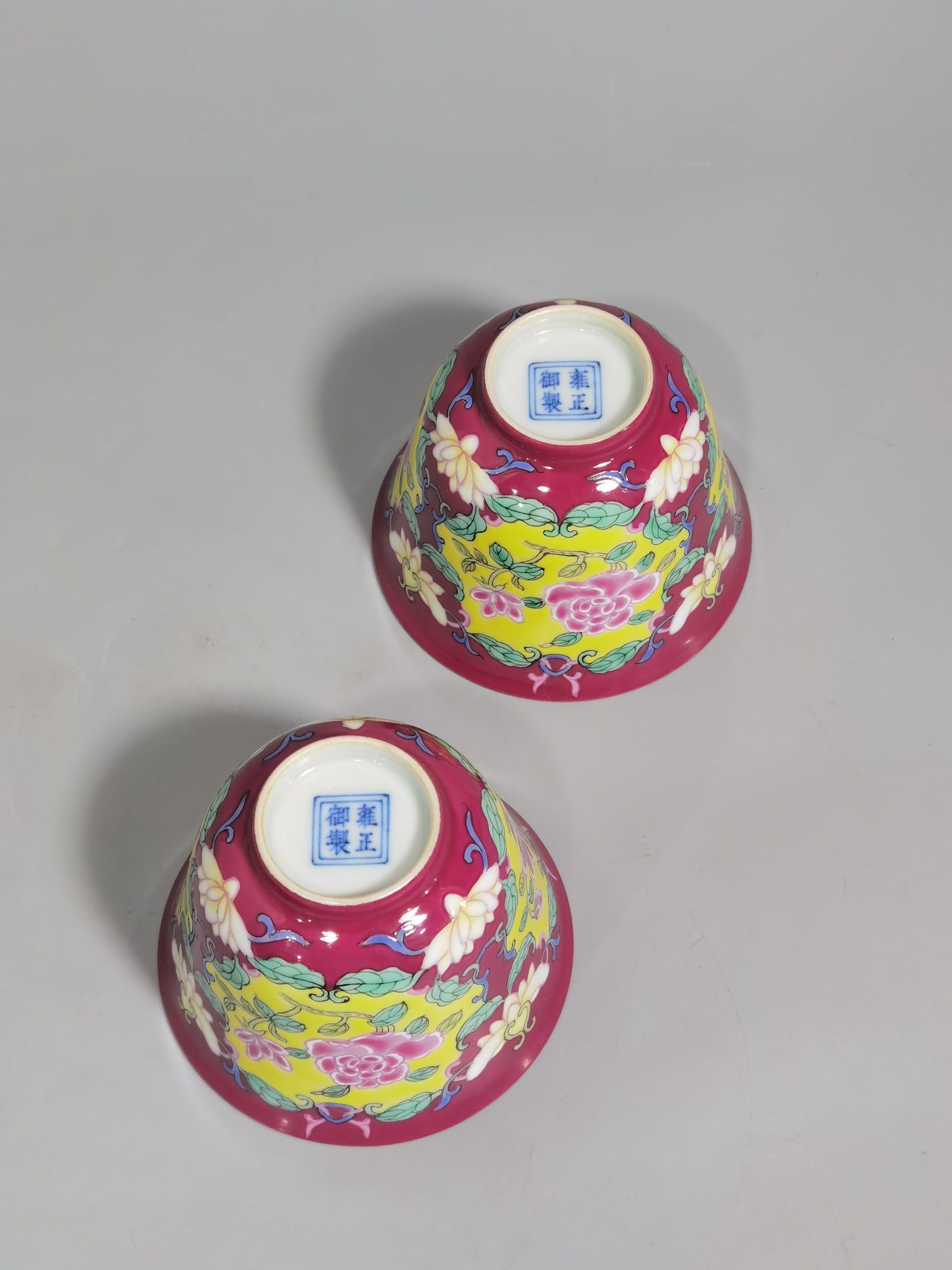 Qing Dynasty Yongzheng rouge ground Yangcai consecrated rose pattern cup