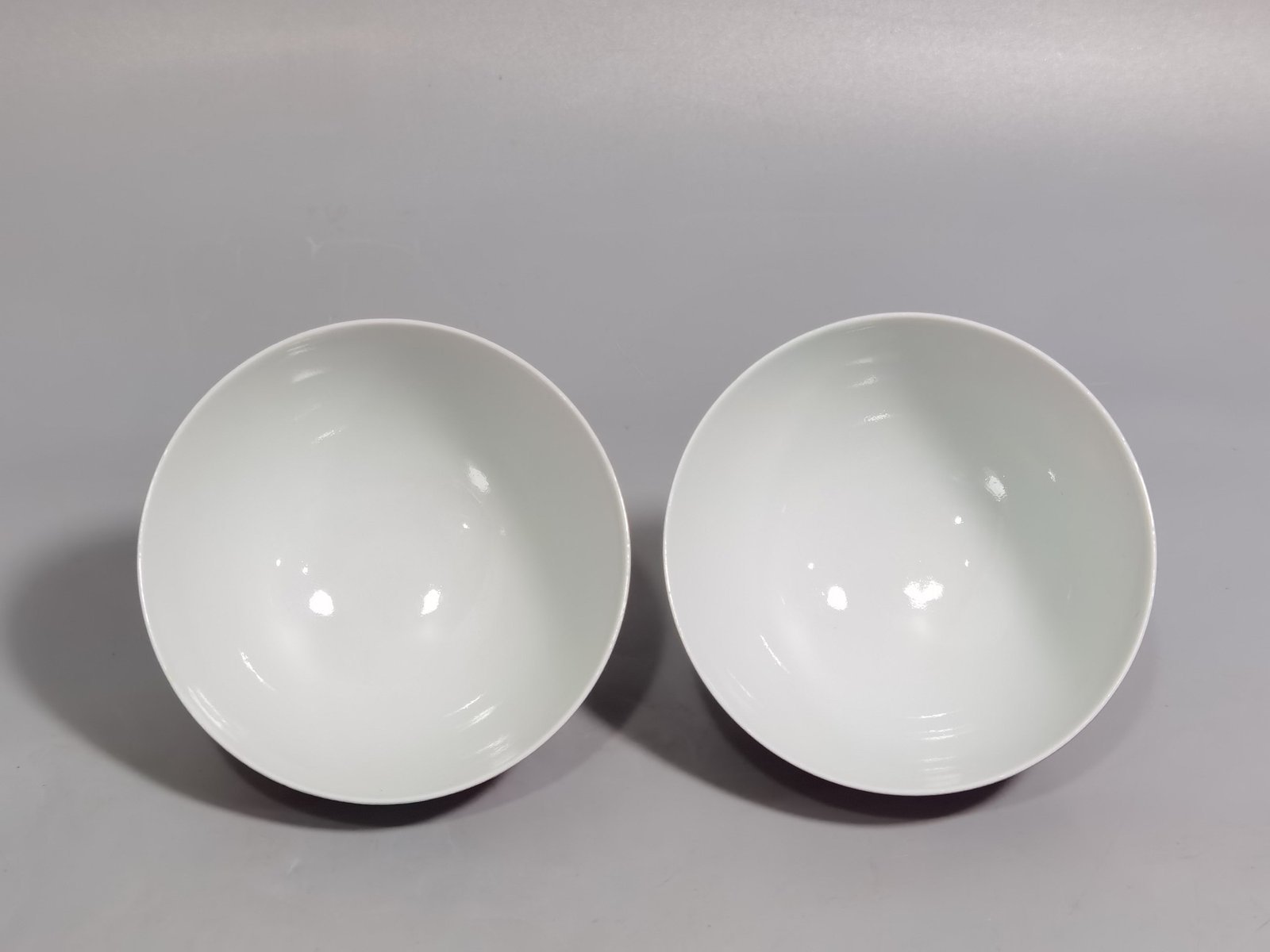 Qing Dynasty Yongzheng rouge ground pastel lotus and kingfisher poem cup