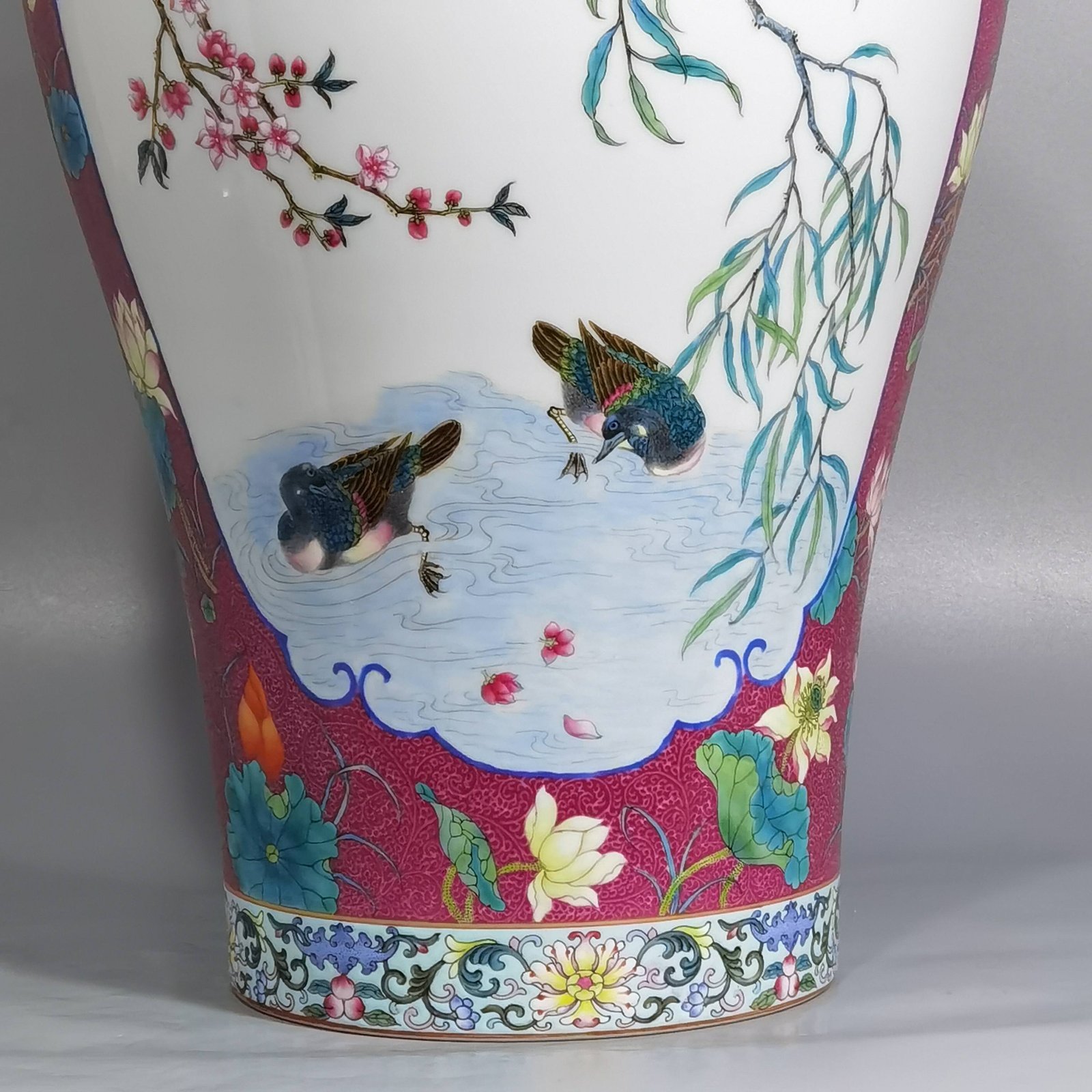 Qing Dynasty Yongzheng carmine red rolled lotus windowed plum vase