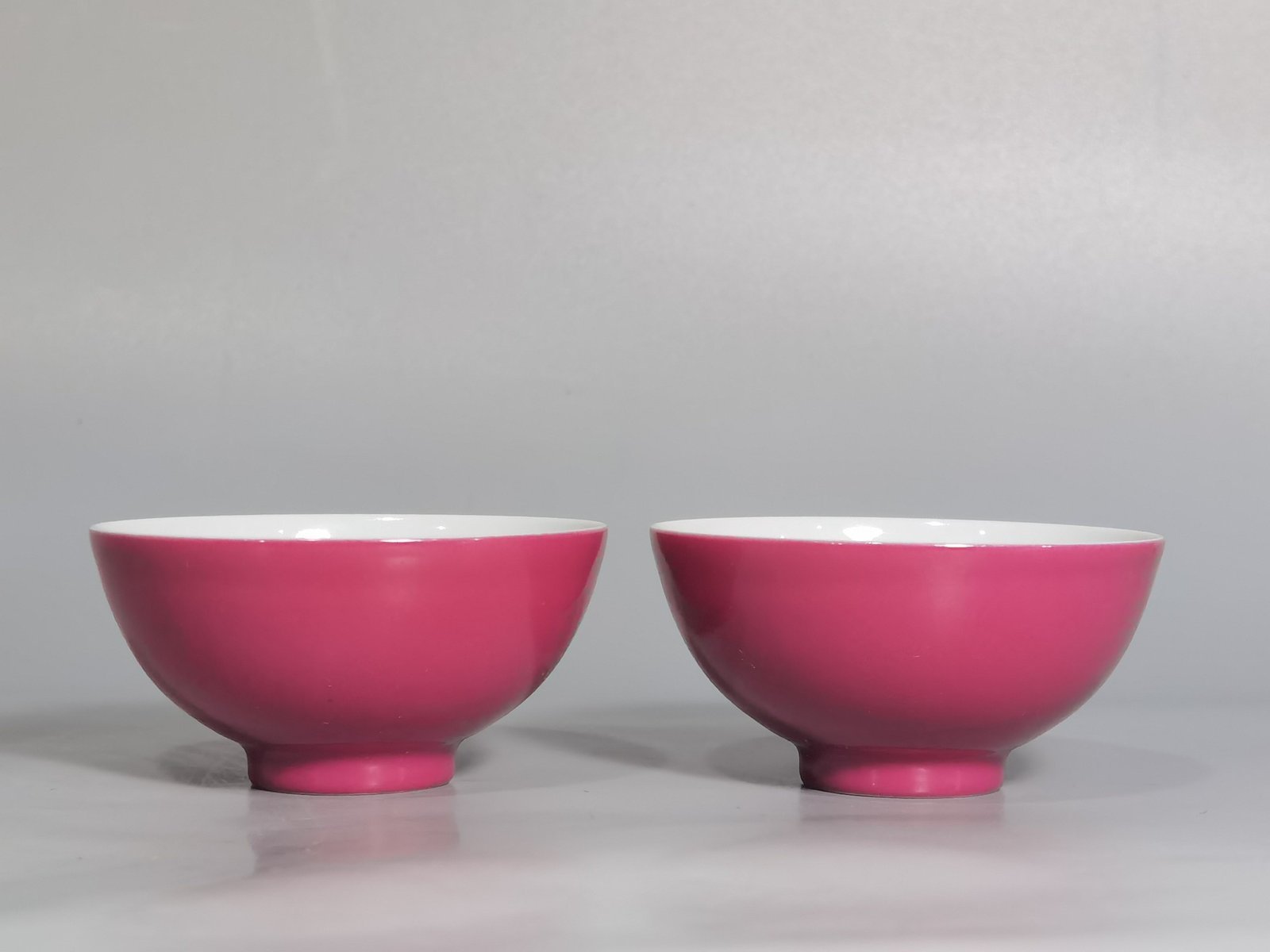 Qing Dynasty Yongzheng pair of carmine red glaze cups