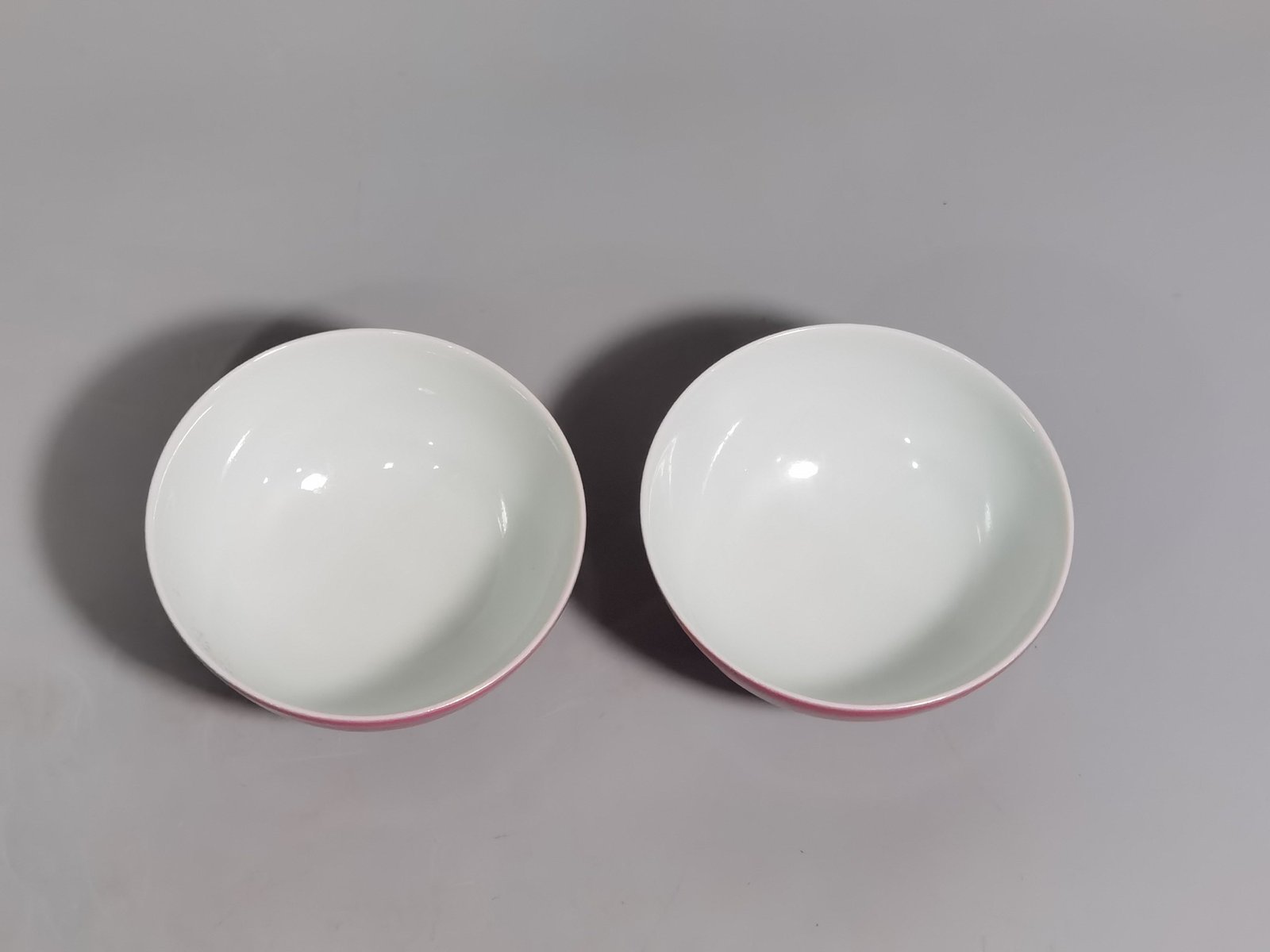 Qing Dynasty Yongzheng pair of carmine red glaze cups