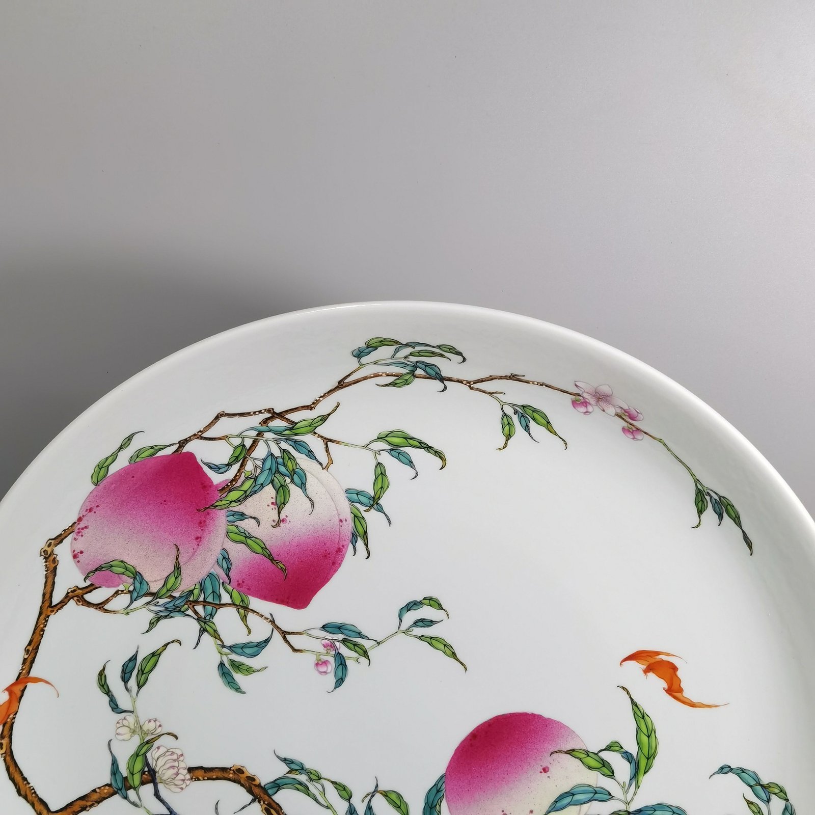 Qing Dynasty Yongzheng large pastel famille rose platter with eight peaches and five bats