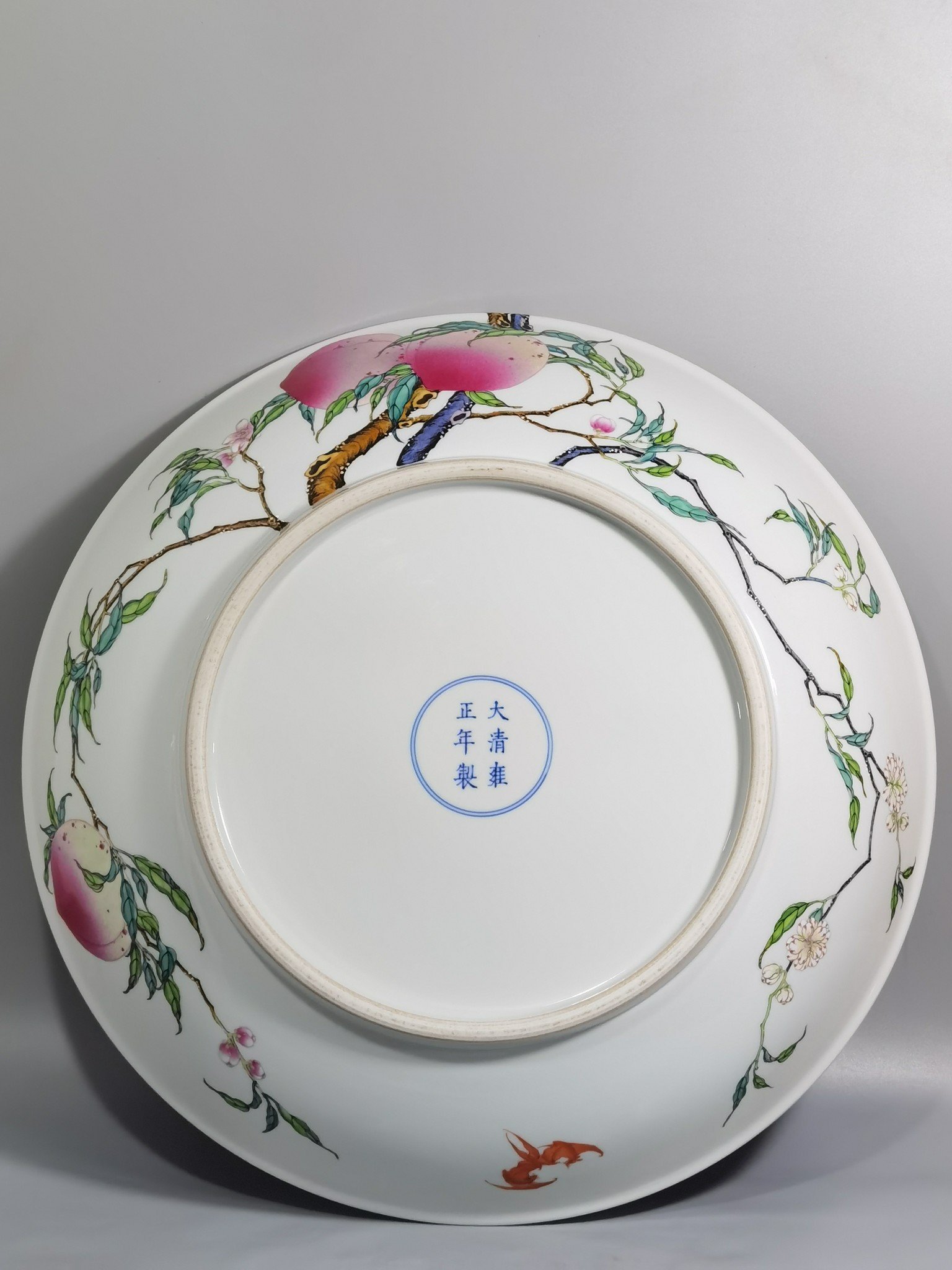 Qing Dynasty Yongzheng large pastel famille rose platter with eight peaches and five bats