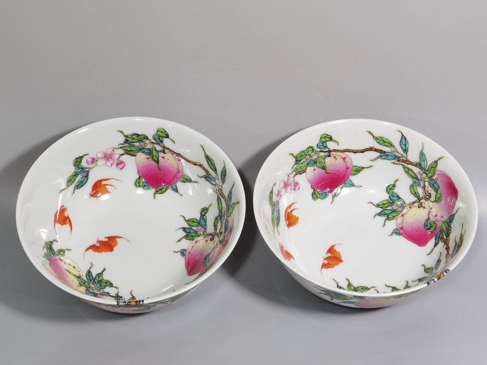 Qing Dynasty Yongzheng pair of pastel famille rose bowls with eight peaches and five bat