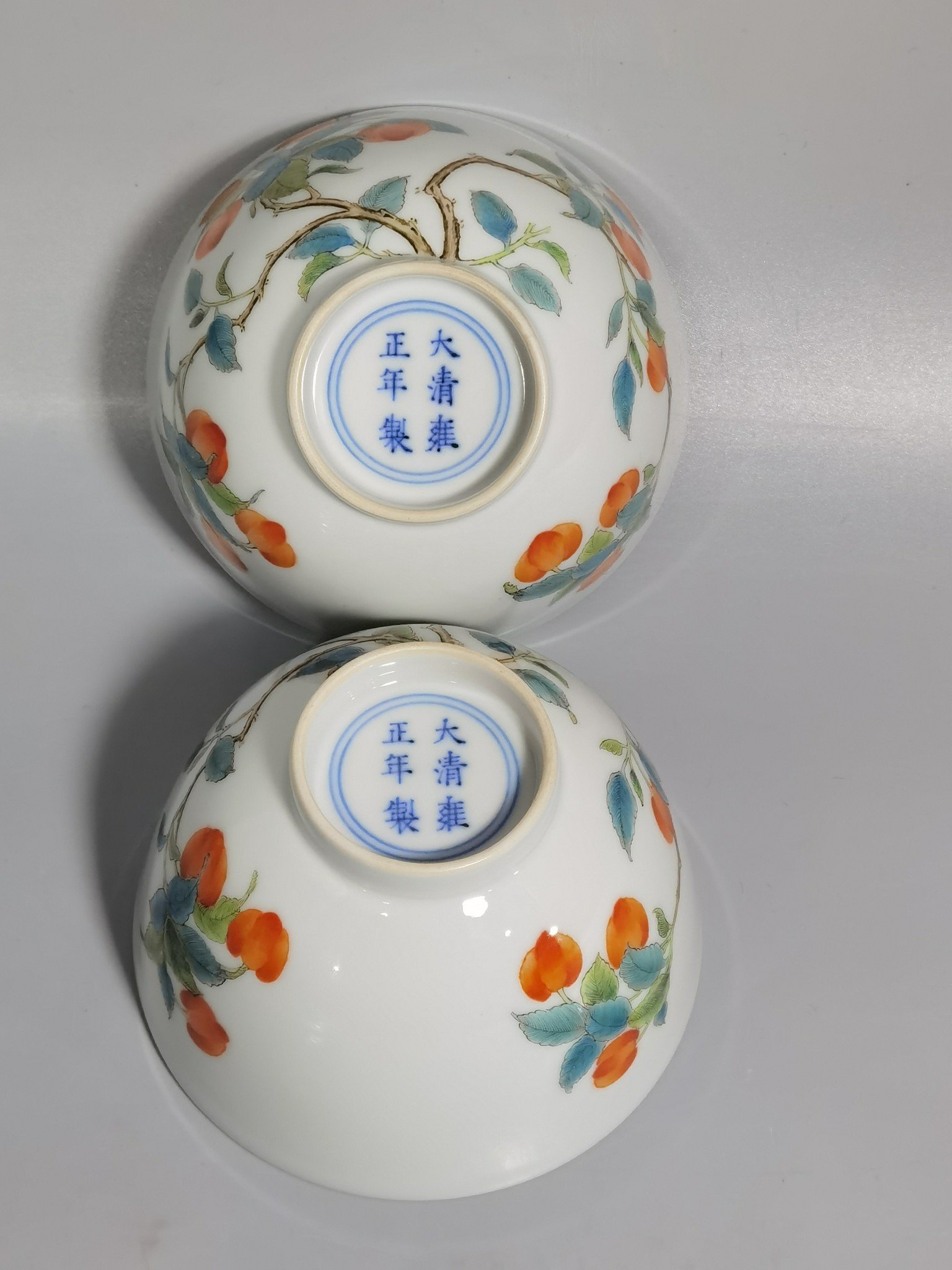 Qing Dynasty Yongzheng pair of pastel pastel cherry and flower pattern tea rounds