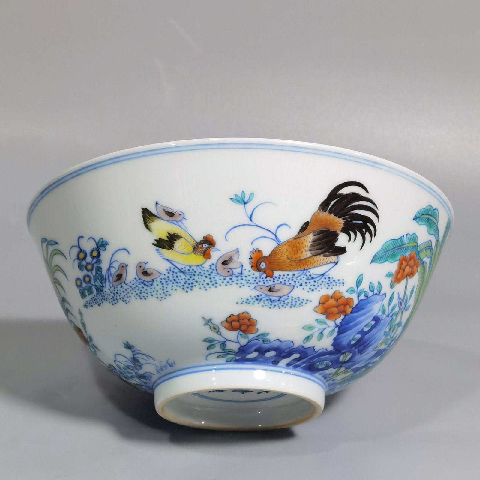 Qing Dynasty Yongzheng blue and white Doucai chicken picture bowl