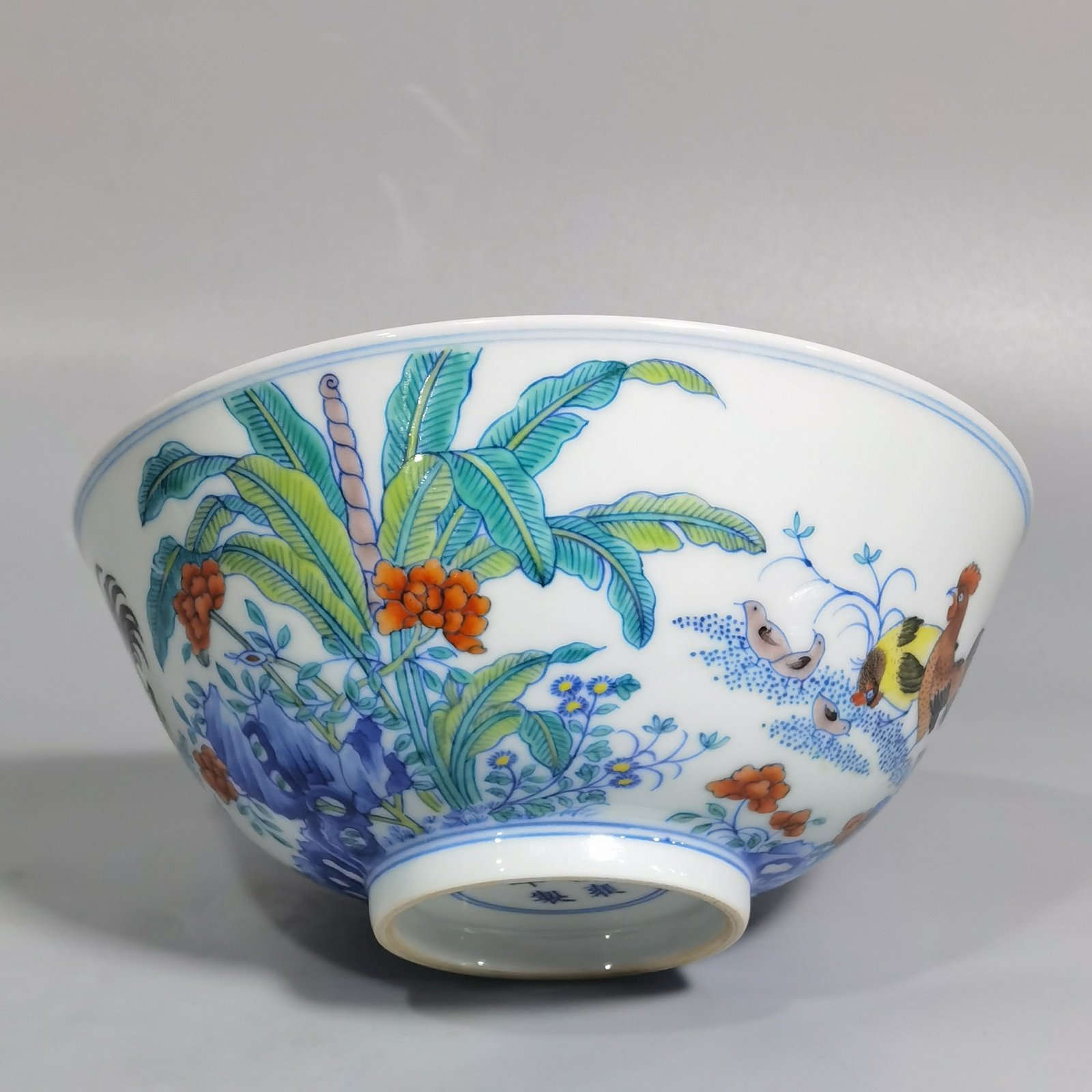 Qing Dynasty Yongzheng blue and white Doucai chicken picture bowl
