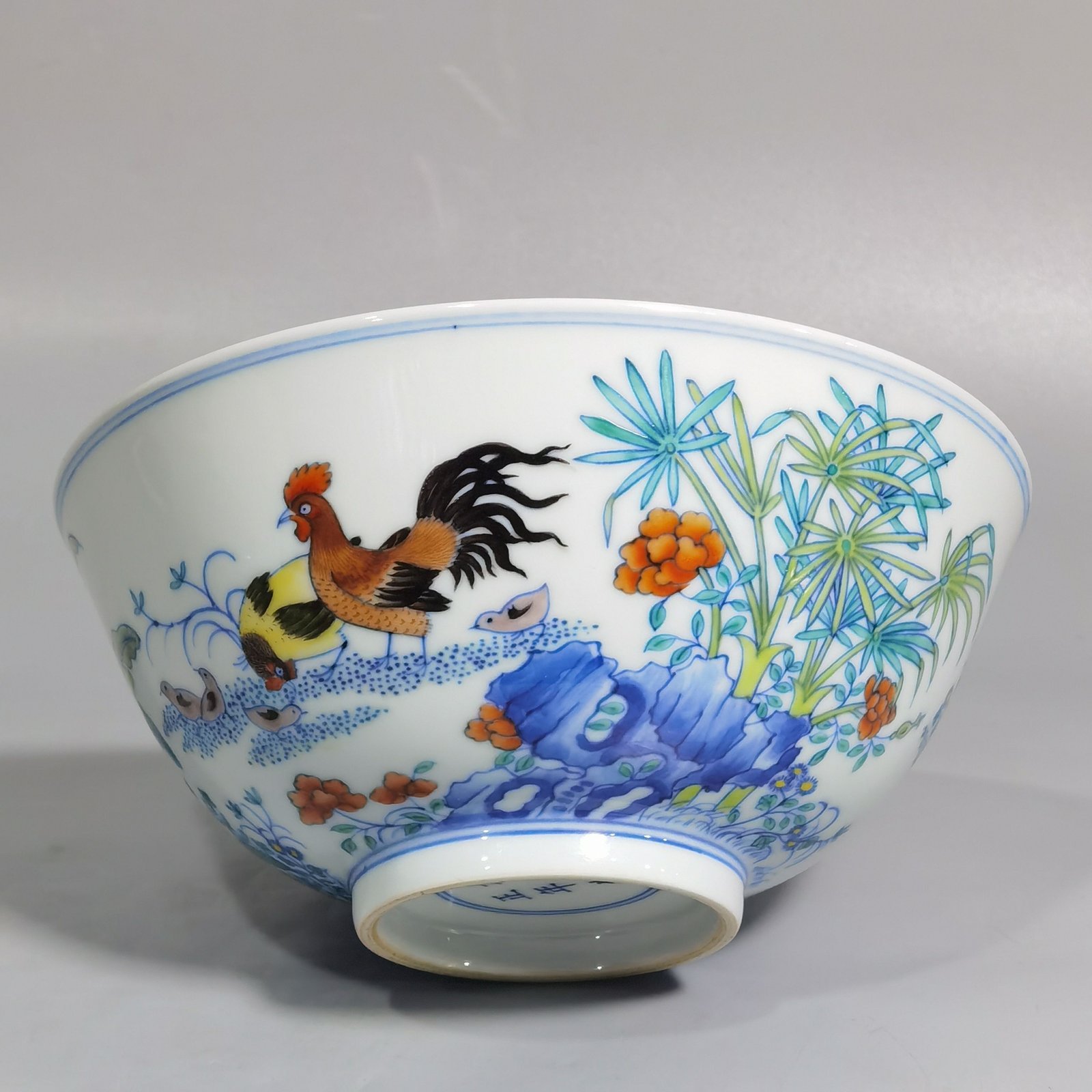 Qing Dynasty Yongzheng blue and white Doucai chicken picture bowl