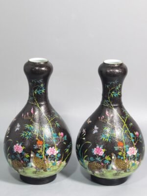 Qing Dynasty Yongzheng black ground with flowers and pastels bamboo for peace garlic vase