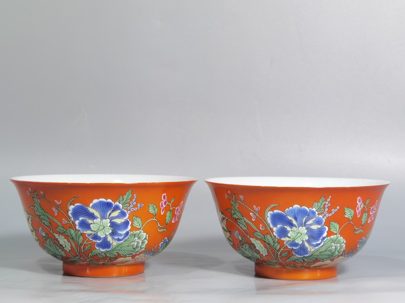 Qing Dynasty Yongzheng pair of enamel colored coral red ground nine-autumn bowls
