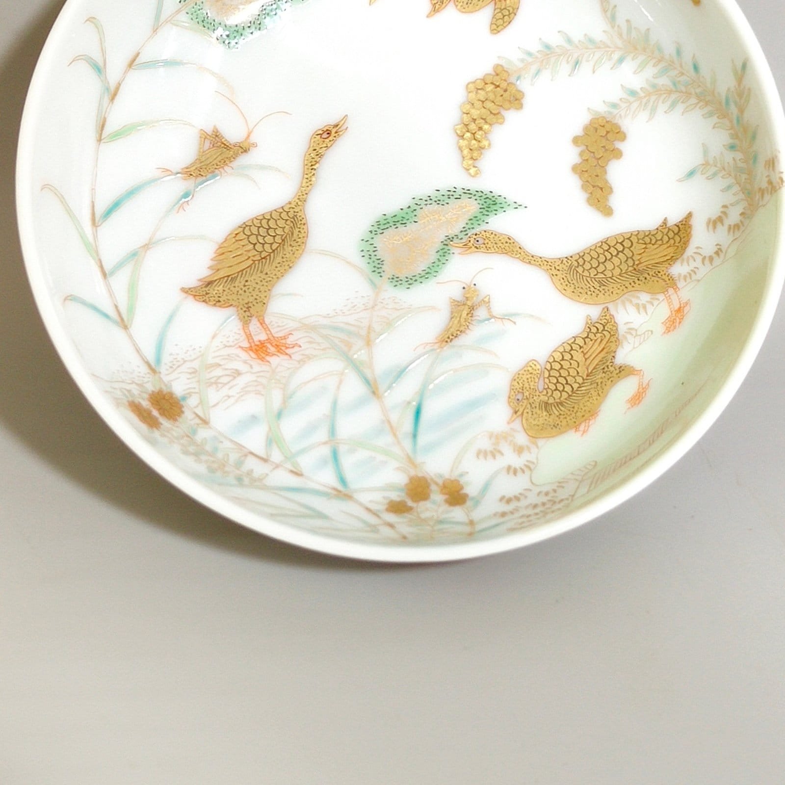 Qing Dynasty Yongzheng Small plate with golden reeds and wild geese