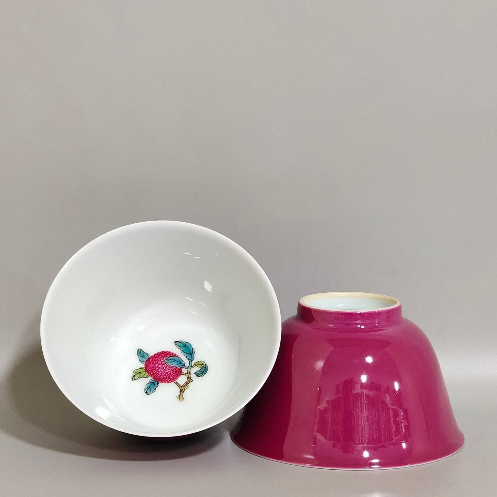 Qing Dynasty Yongzheng pair of cups with rouge red interior and pastel lychee pattern
