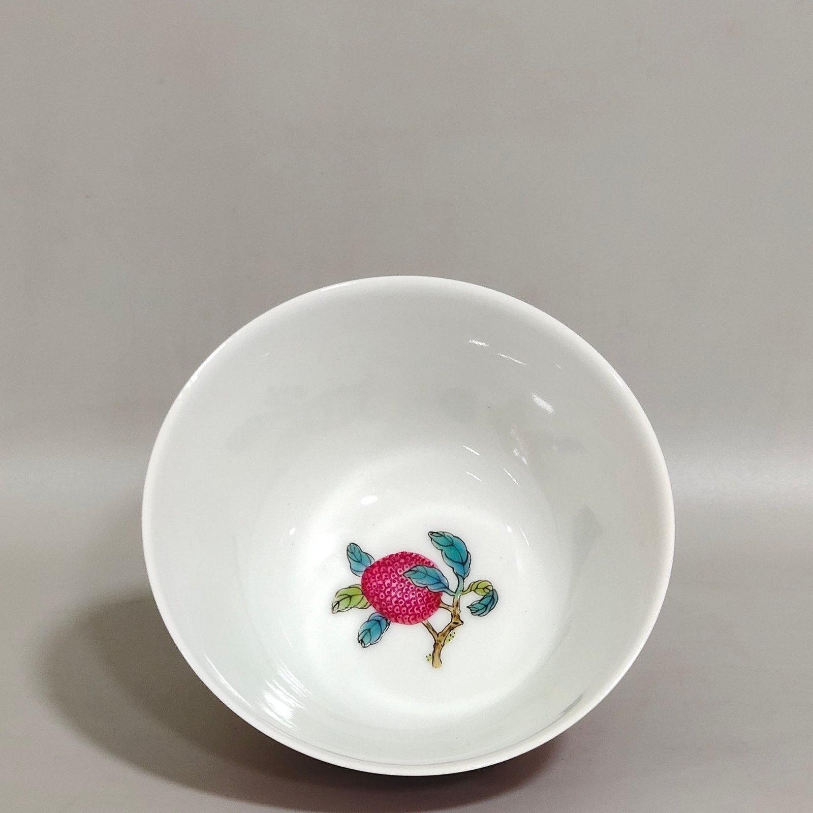 Qing Dynasty Yongzheng pair of cups with rouge red interior and pastel lychee pattern