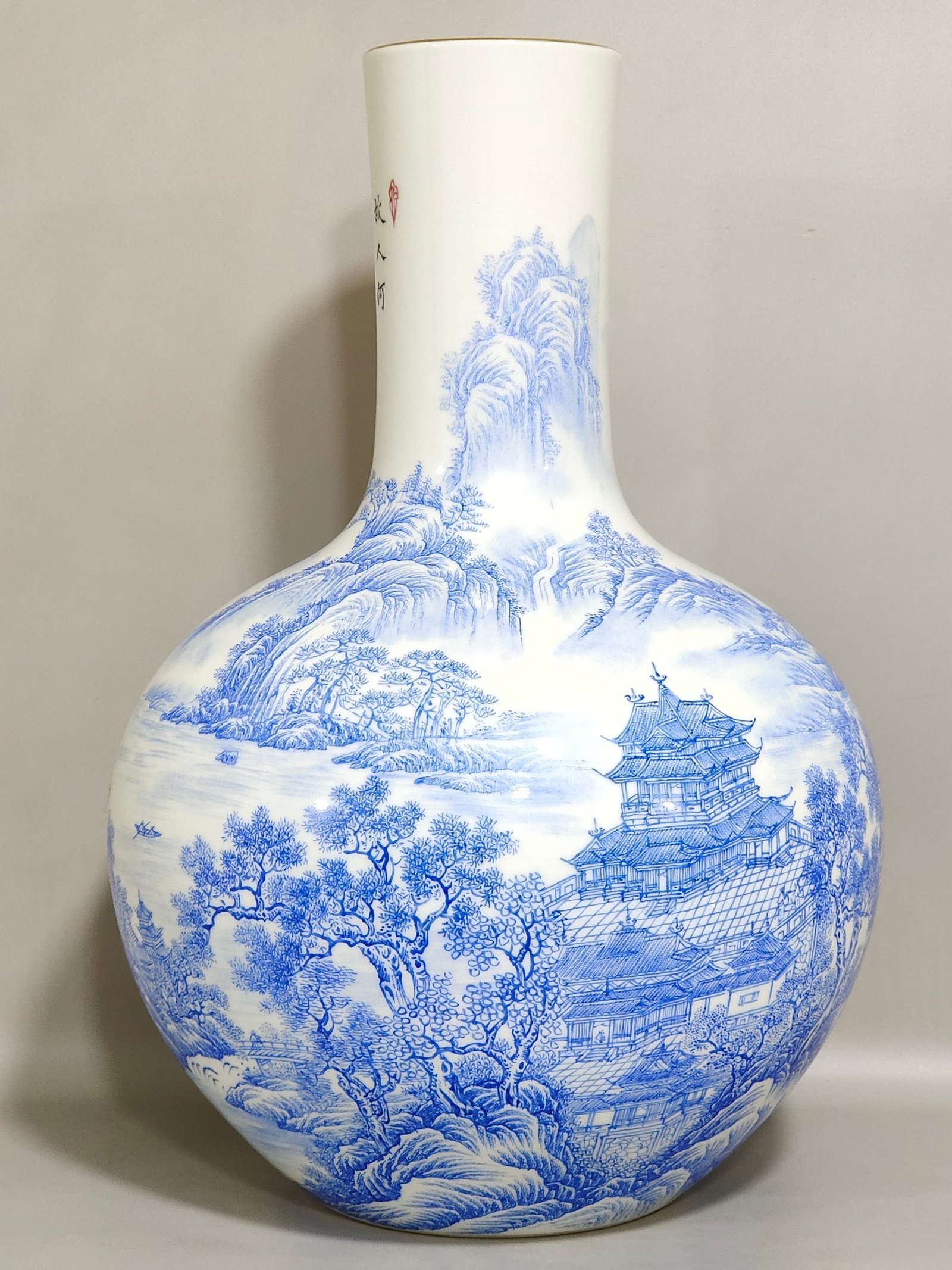 Qing Dynasty Yongzheng blue landscape attic inscribed poem celestial ball vase