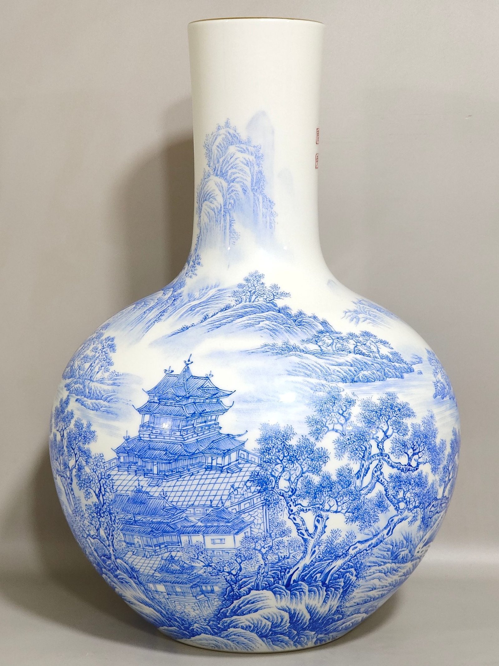 Qing Dynasty Yongzheng blue landscape attic inscribed poem celestial ball vase