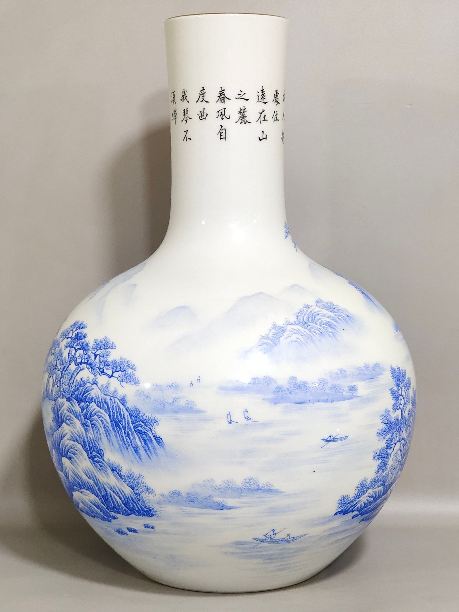 Qing Dynasty Yongzheng blue landscape attic inscribed poem celestial ball vase