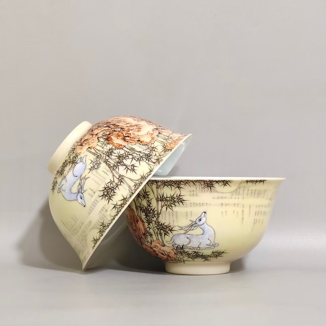 Qing Dynasty Yongzheng ivory white glaze pastel bamboo stone deer pattern poem cup