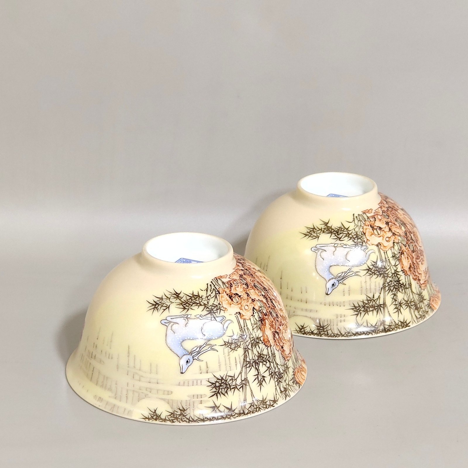 Qing Dynasty Yongzheng ivory white glaze pastel bamboo stone deer pattern poem cup