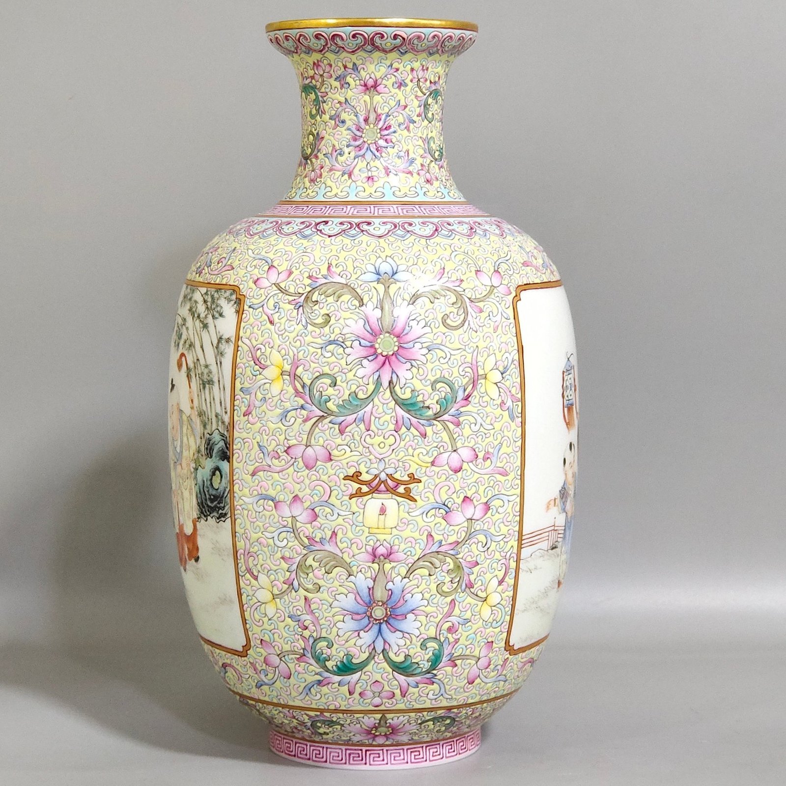 Qing Dynasty Yongzheng thin vase with picture of baby playing with an open window