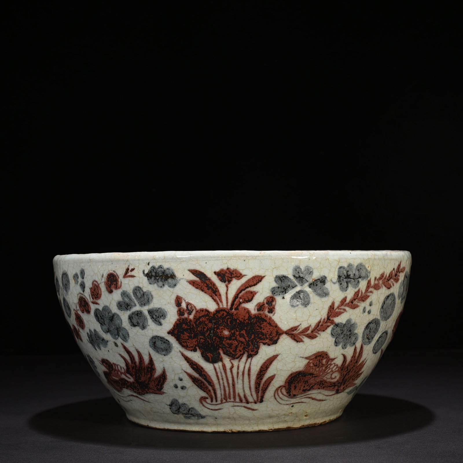 Yuan Dynasty blue and white underglaze red lotus pond vat with mandarin duck pattern