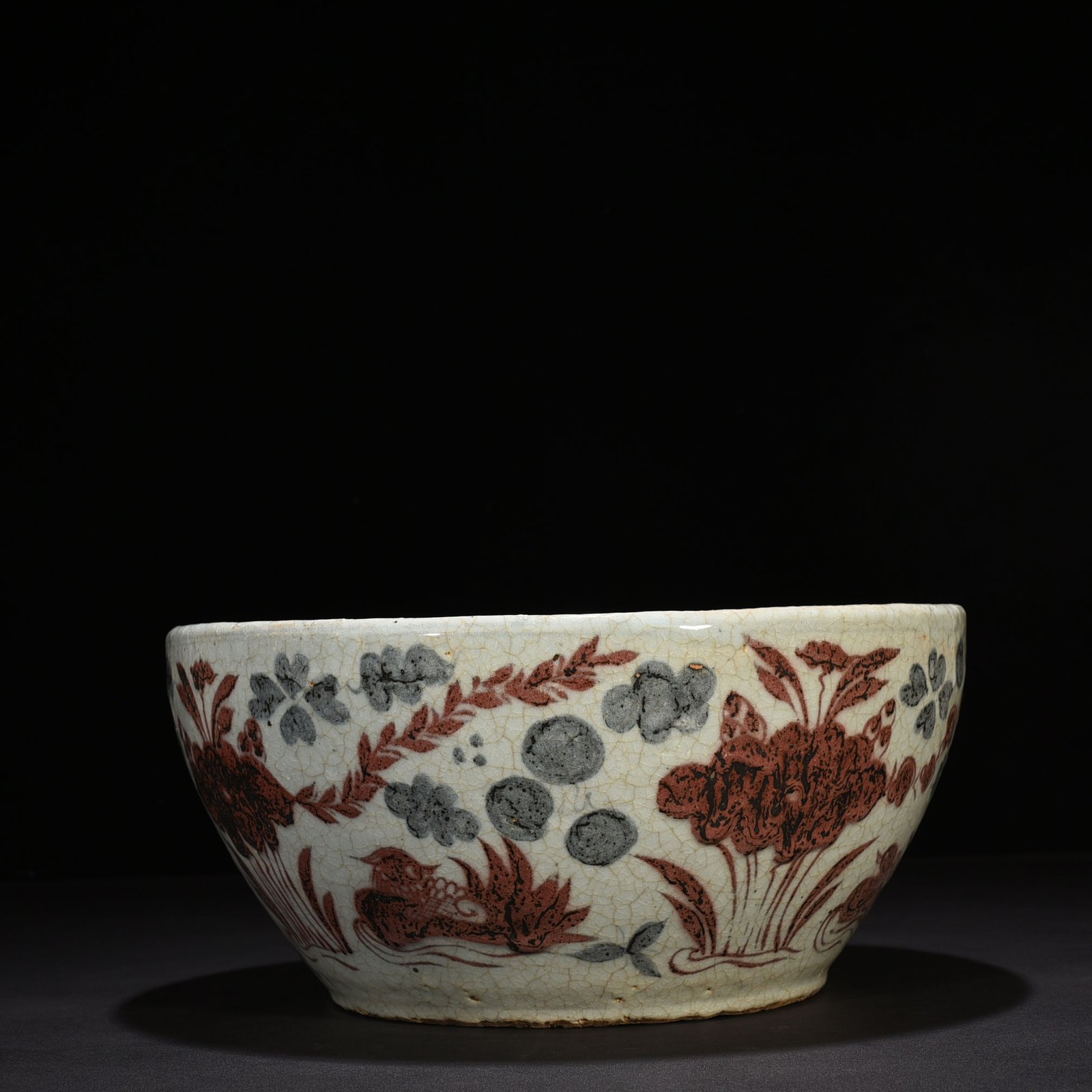 Yuan Dynasty blue and white underglaze red lotus pond vat with mandarin duck pattern
