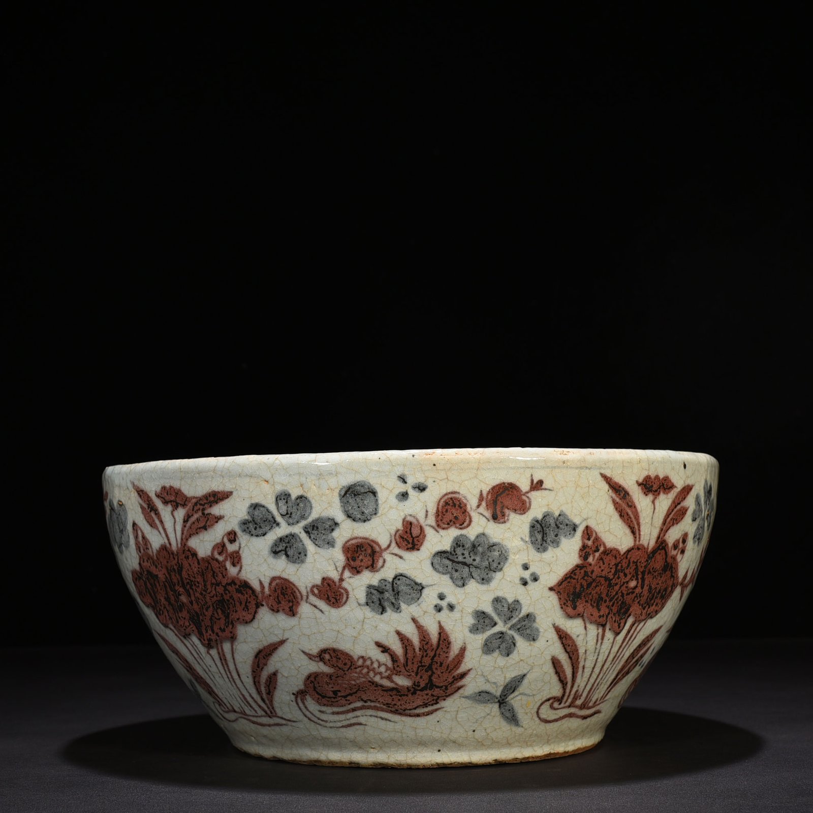 Yuan Dynasty blue and white underglaze red lotus pond vat with mandarin duck pattern