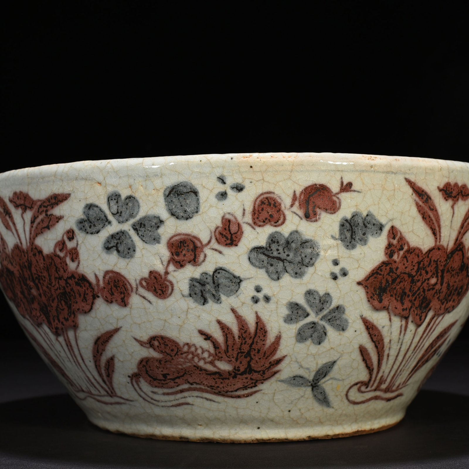 Yuan Dynasty blue and white underglaze red lotus pond vat with mandarin duck pattern