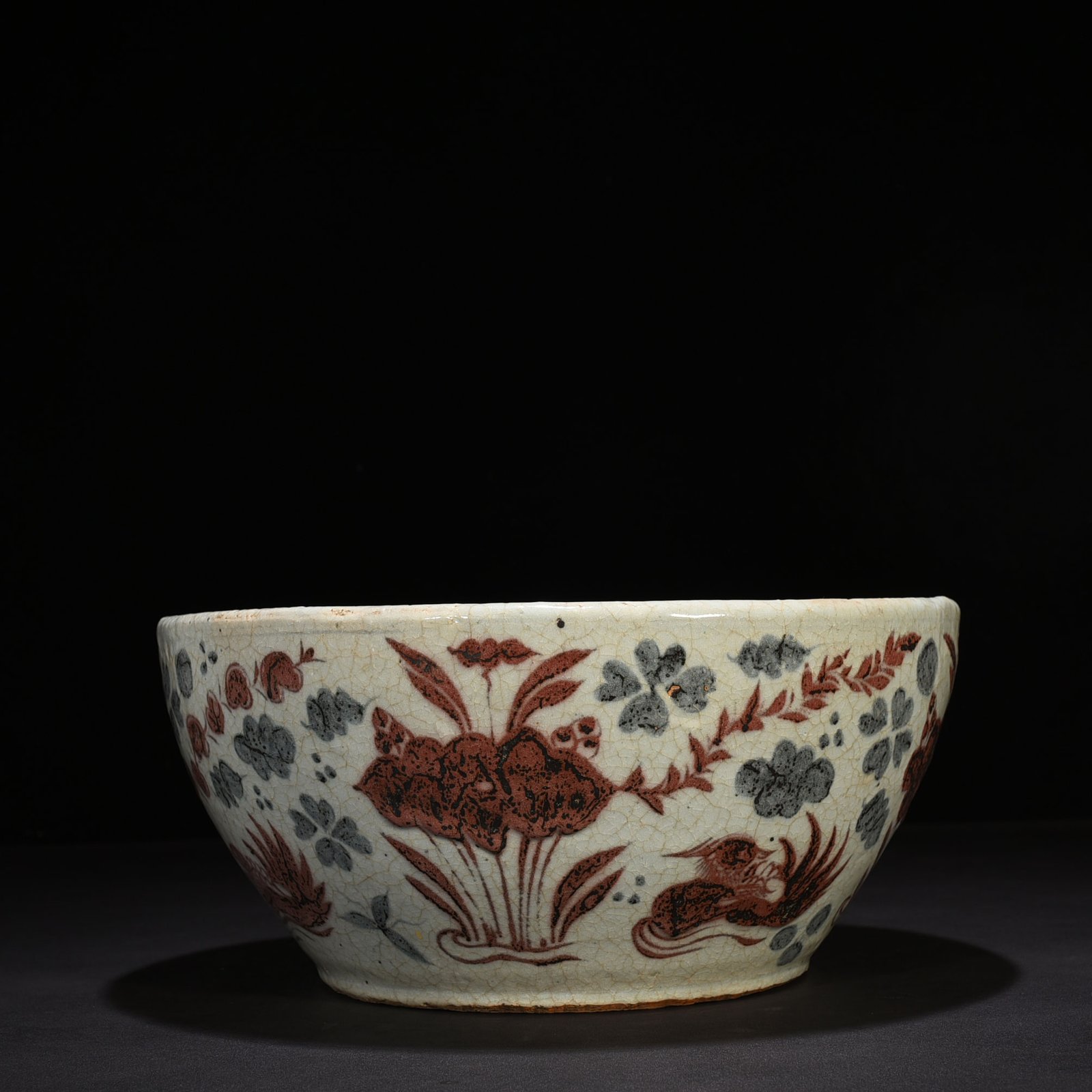 Yuan Dynasty blue and white underglaze red lotus pond vat with mandarin duck pattern