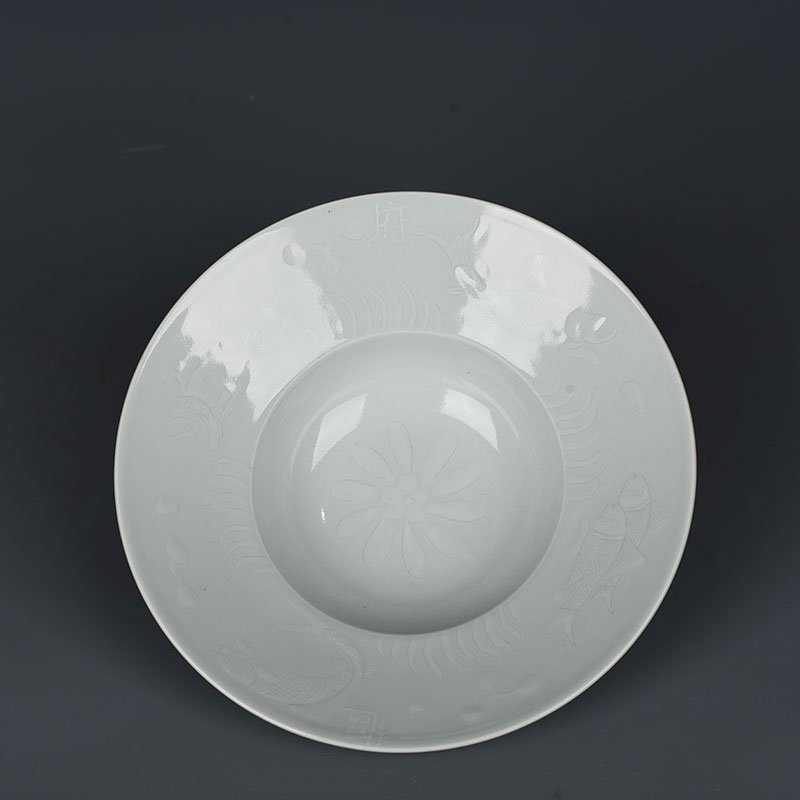 Yuan Dynasty carved fish and algae pattern folded bowl