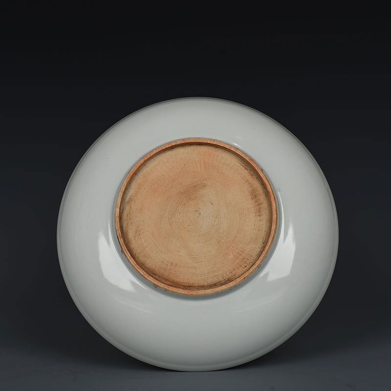 Yuan Dynasty kiln egg white glaze carved dragon plate
