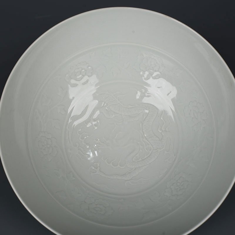 Yuan Dynasty kiln egg white glaze carved dragon bowl