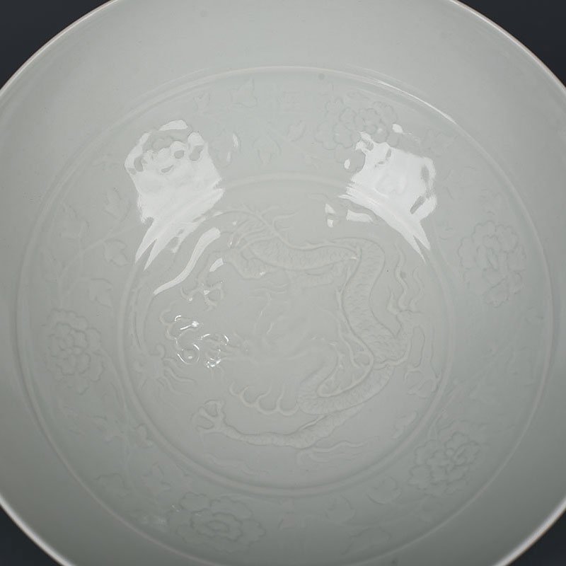 Yuan Dynasty kiln egg white glaze carved dragon bowl