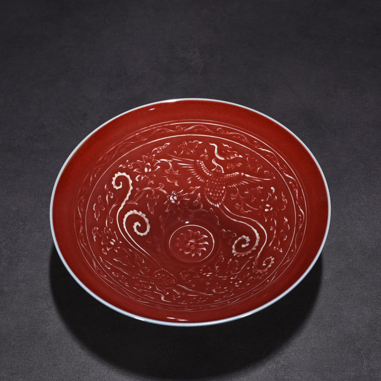 Yuan Dynasty kiln red glaze bamboo hat bowl with engraved phoenix pattern