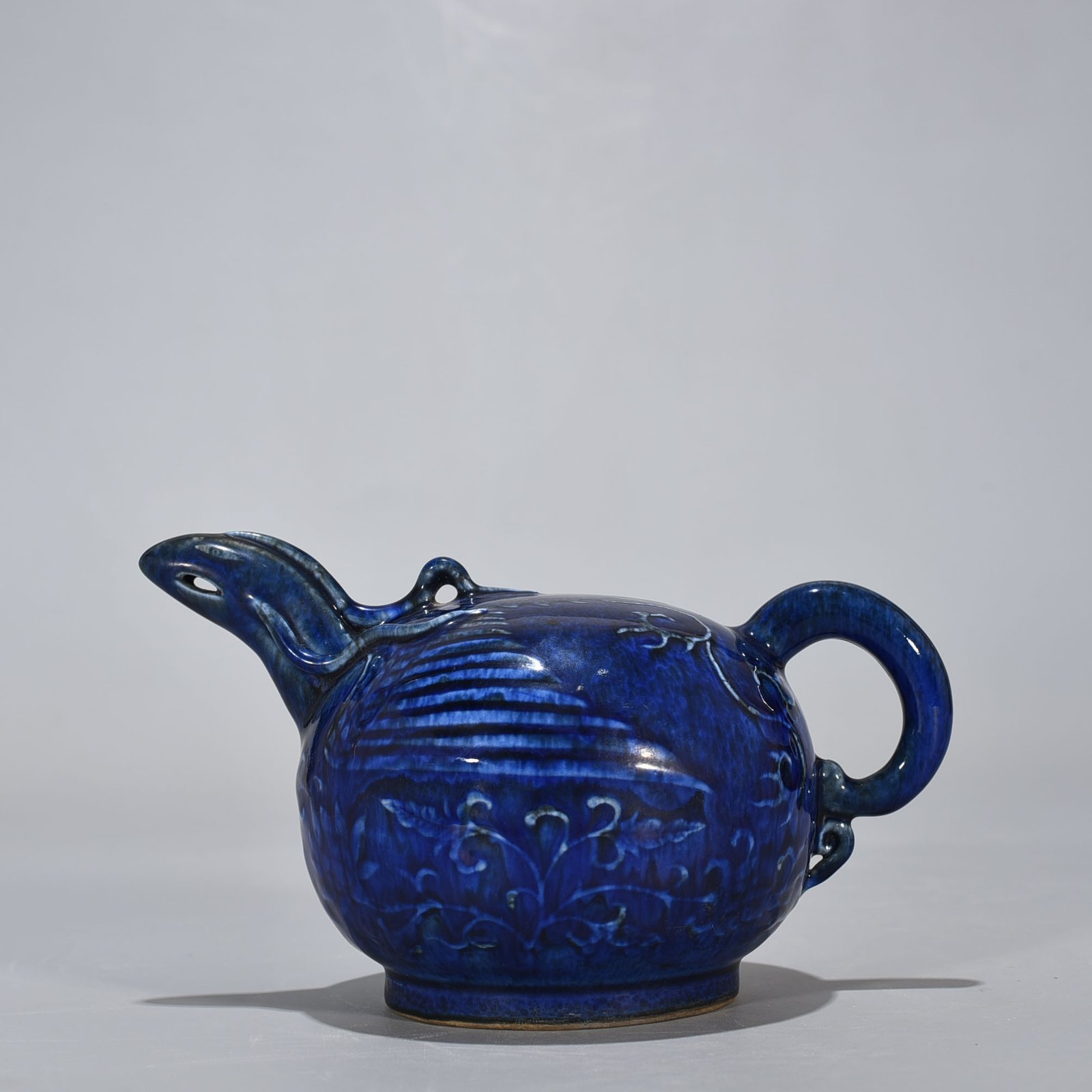 Yuan Dynasty blue glaze phoenix head backflow pot