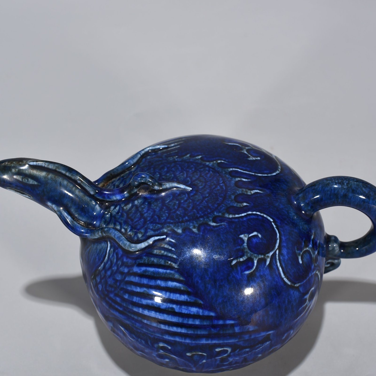 Yuan Dynasty blue glaze phoenix head backflow pot