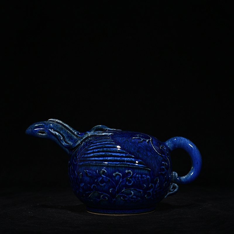 Yuan Dynasty blue glaze carved phoenix head backflow kettle