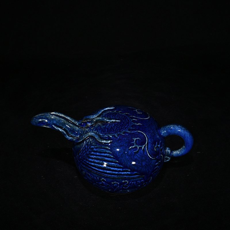 Yuan Dynasty blue glaze carved phoenix head backflow kettle
