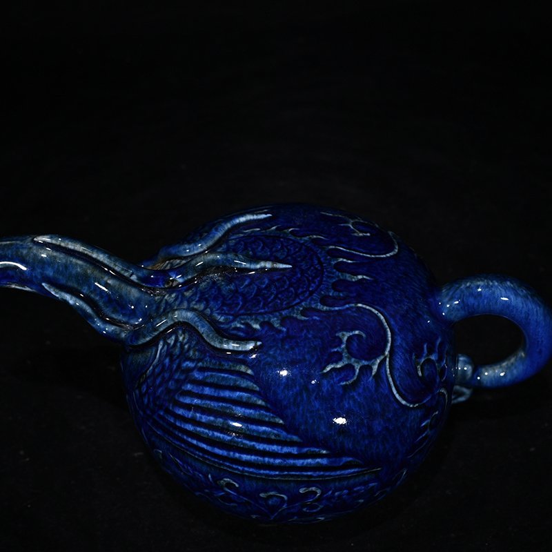 Yuan Dynasty blue glaze carved phoenix head backflow kettle