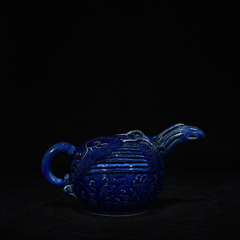 Yuan Dynasty blue glaze carved phoenix head backflow kettle