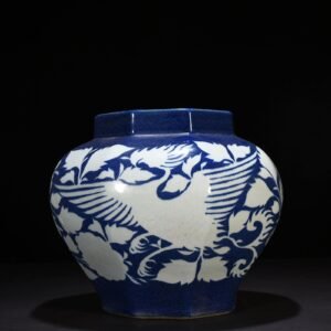 Yuan Dynast blue glaze carved with branches and phoenix pattern octagonal jar