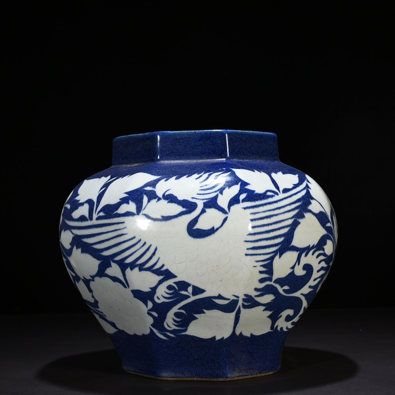 Yuan Dynast blue glaze carved with branches and phoenix pattern octagonal jar