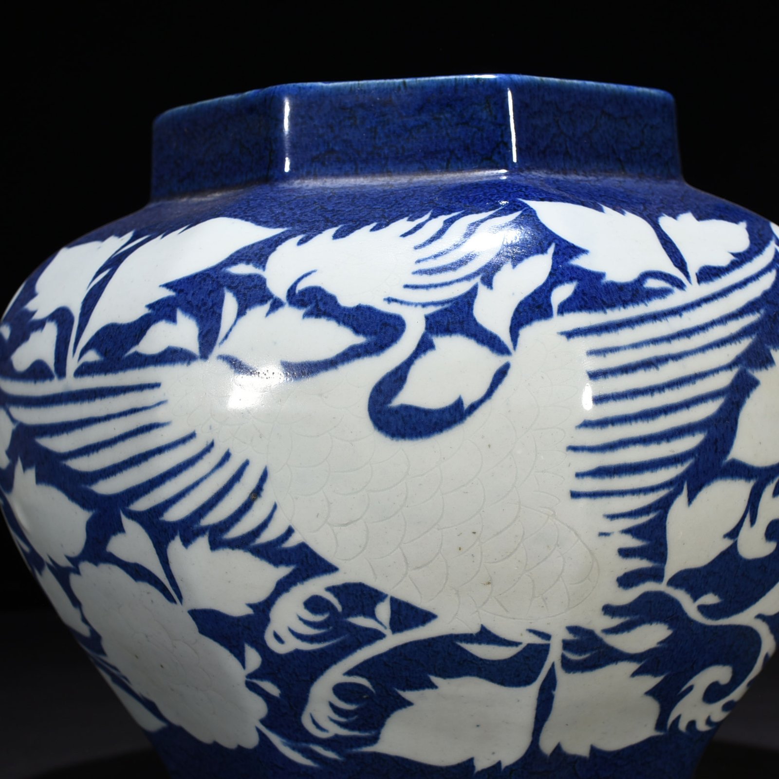 Yuan Dynast blue glaze carved with branches and phoenix pattern octagonal jar