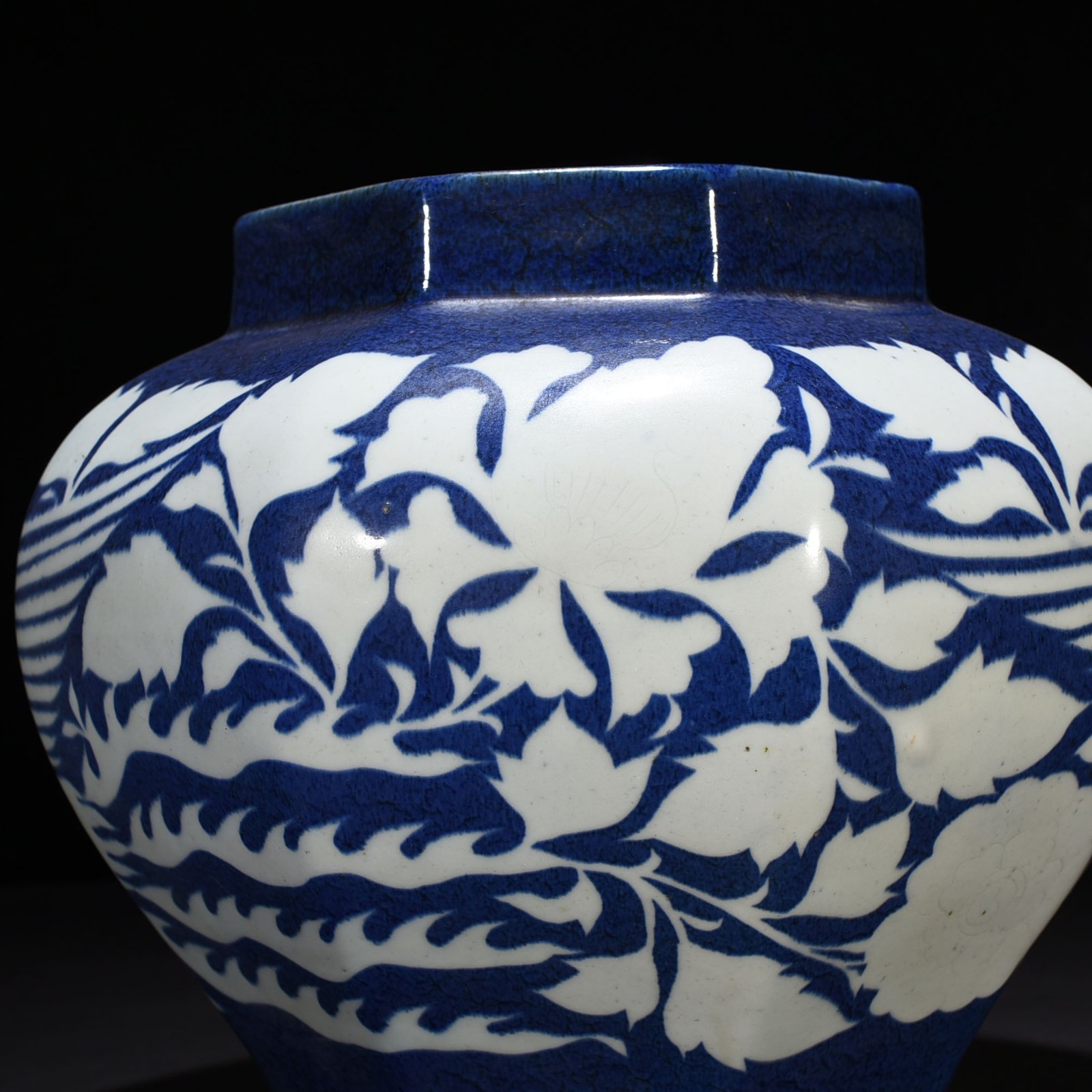 Yuan Dynast blue glaze carved with branches and phoenix pattern octagonal jar