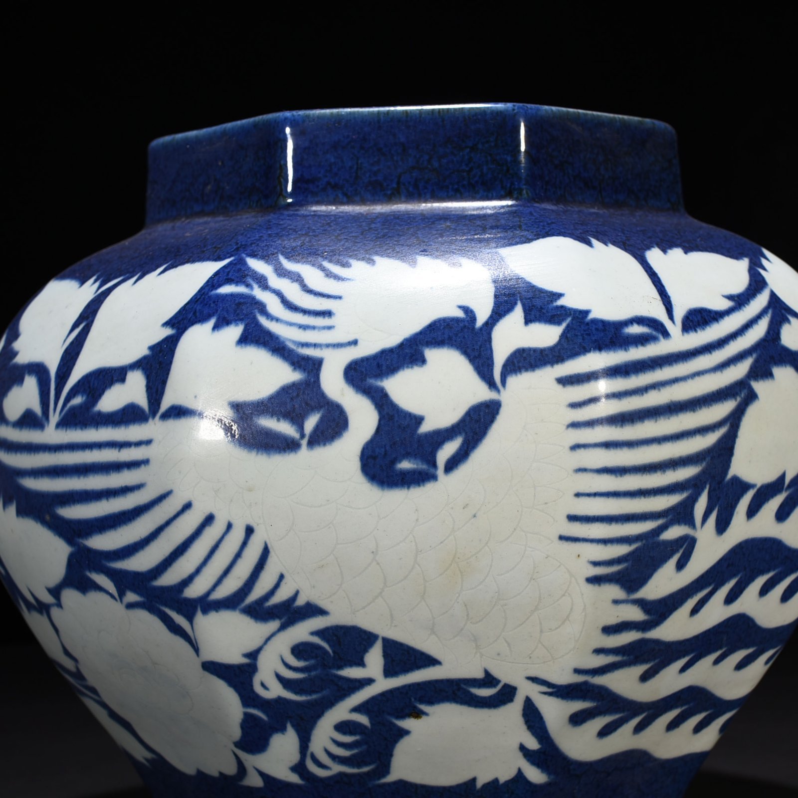 Yuan Dynast blue glaze carved with branches and phoenix pattern octagonal jar