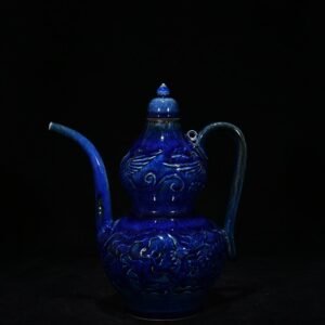Yuan Dynasty blue glaze carved with dragon and phoenix patterns gourd holding pot