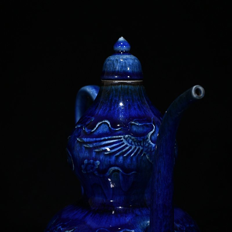 Yuan Dynasty blue glaze carved with dragon and phoenix patterns gourd holding pot
