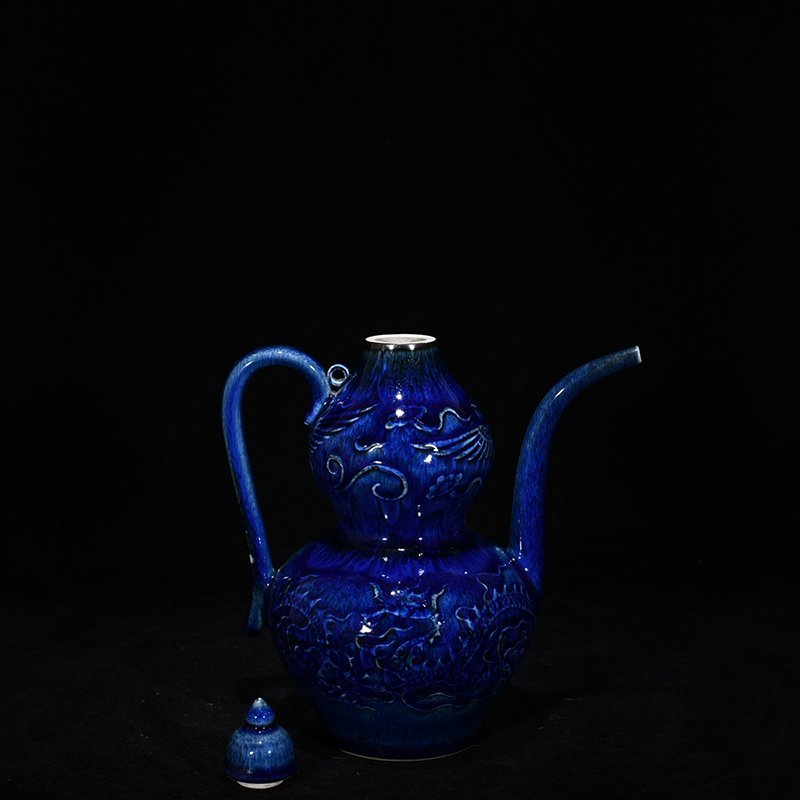 Yuan Dynasty blue glaze carved with dragon and phoenix patterns gourd holding pot