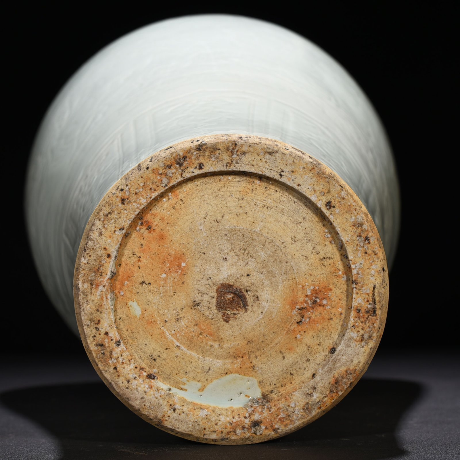 Yuan Dynasty white glaze carved with peony pattern plum vase