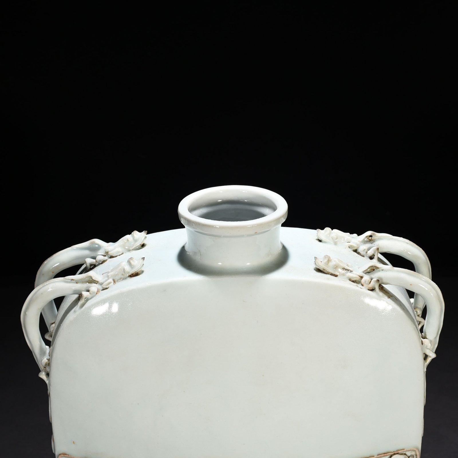 Yuan Dynasty white glazed plastic lion rolling hydrangea four series flat bottle