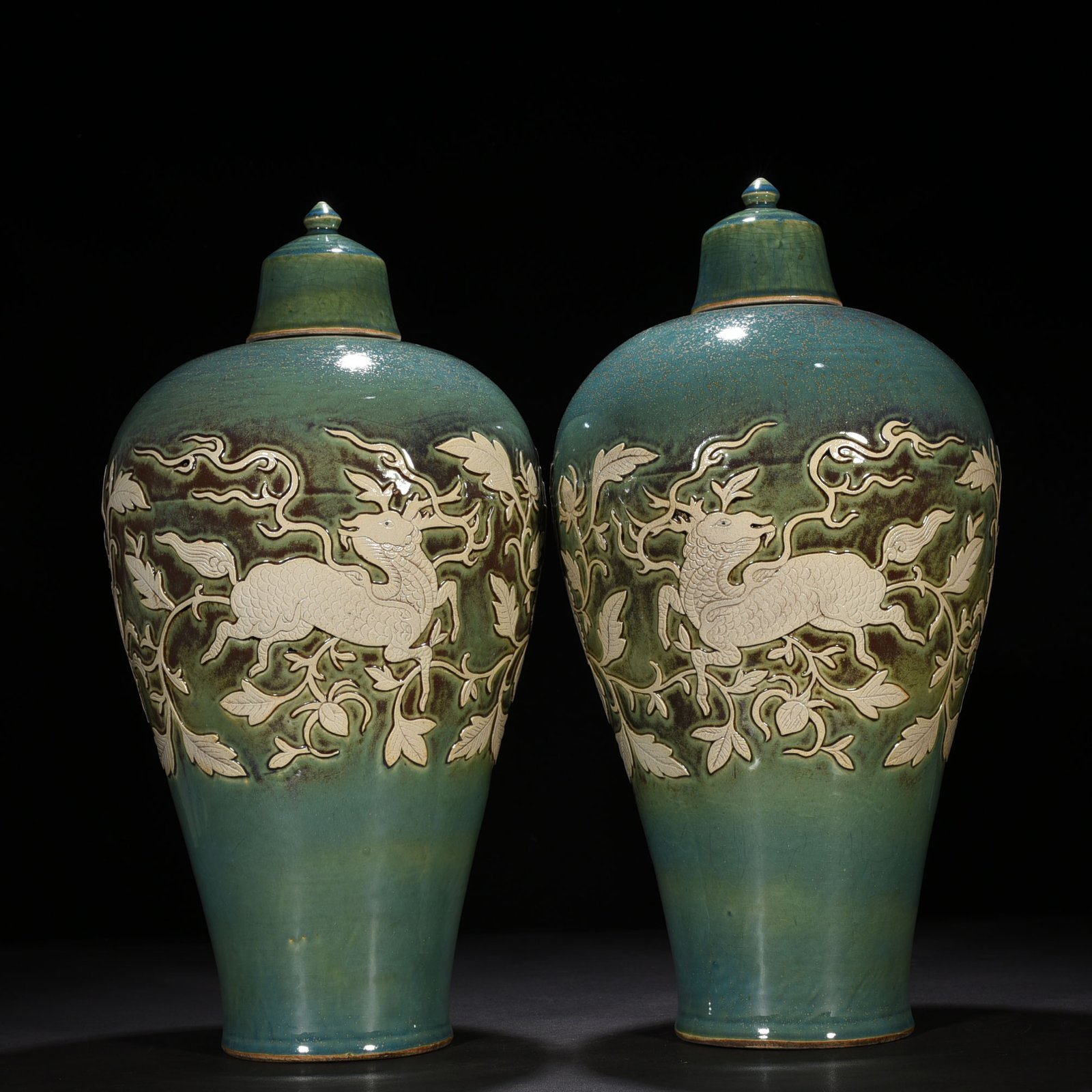 Yuan Dynasty kiln glaze carved plum vase with wrapped branches and unicorn pattern